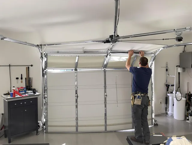 Pomona Garage Door Repair specialist performing precise section replacement on Pomona garage door