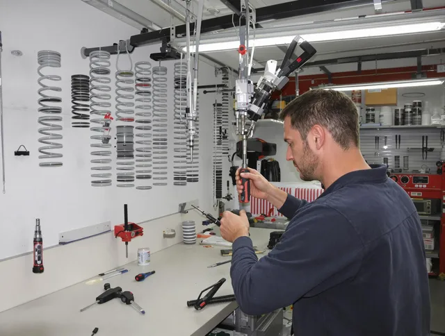 Pomona Garage Door Repair safety certified technician performing precision spring replacement in Pomona