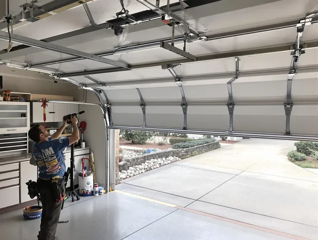 Garage door track repair service by Pomona Garage Door Repair in Pomona
